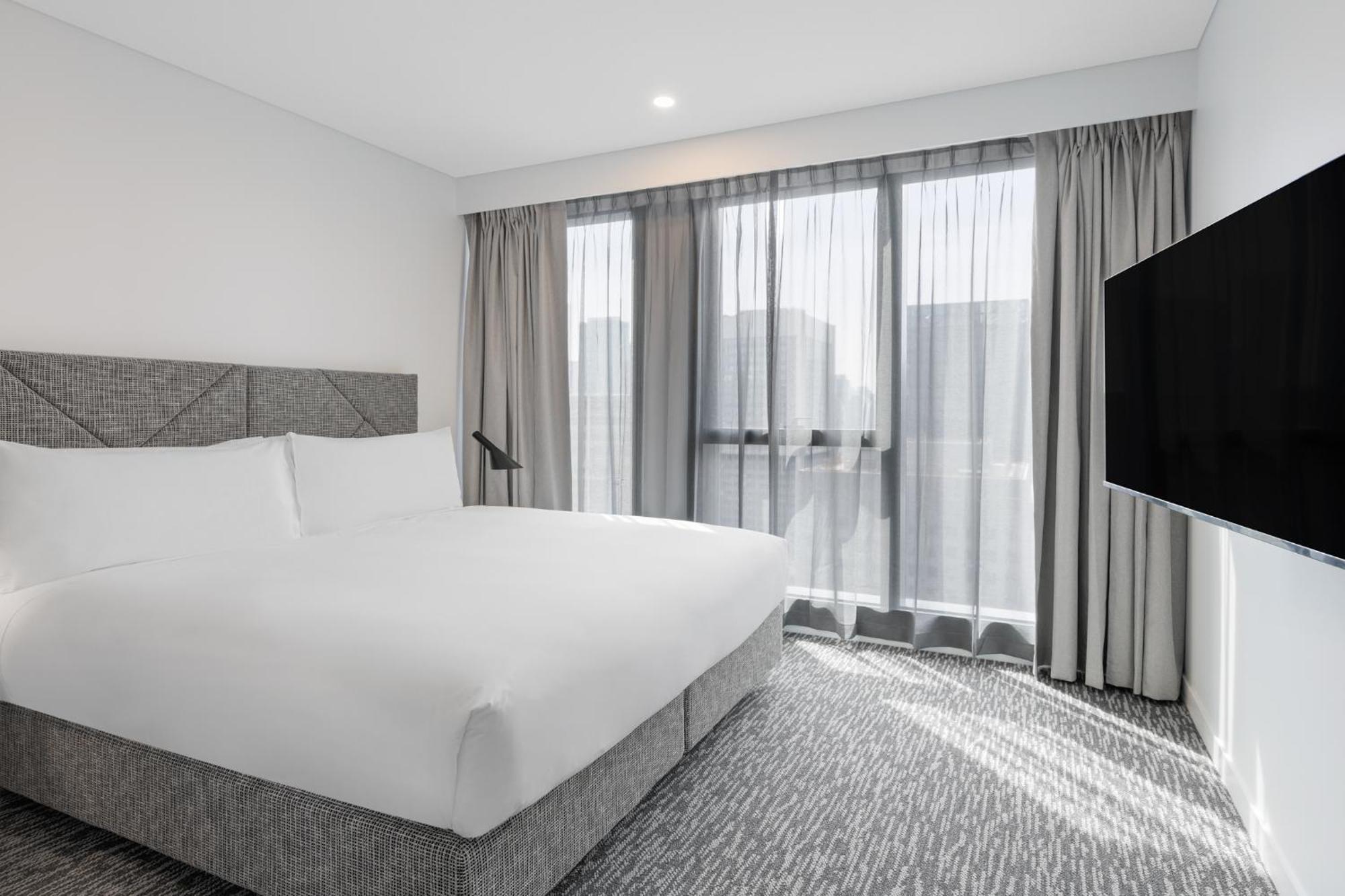 Meriton Suites ملبورن المظهر الخارجي الصورة A bedroom at the hotel